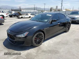 2018 Maserati Ghibli with VIN ZAM57XSA2J1286666, listed as a Copart auction lot 54070305 with 60,562 mi miles and Salvage Title. Bid and sale history available at carsss.com. Image 1.