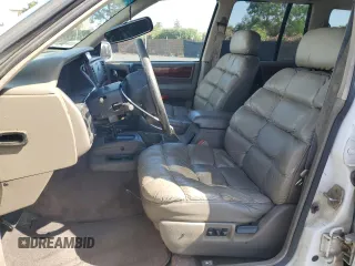 1995 Jeep Grand Cherokee Limited z VIN 1J4GZ78S0SC575083, wystawiony jako Copart lot #61047975 z przebiegiem 205 407 mil mil oraz Czysty tytuł • Clean title. Historia ofert i sprzedaży dostępna na DreamBid. Obrazek 7.