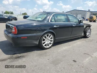2008 Jaguar XJ with VIN SAJWA79B28SH26841, listed as a Copart auction lot 59914574 with 0 mi miles and Salvage Title. Bid and sale history available at carsss.com. Image 3.