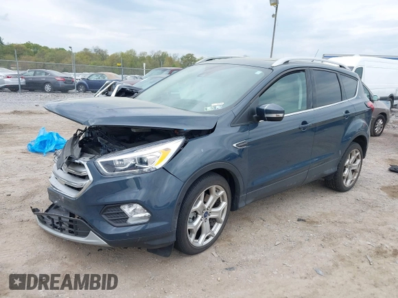 2019 Ford Escape Titanium with VIN 1FMCU9J95KUC19062, listed as a IAAI auction lot 42112188 with 26,100 mi miles. Bid and sale history available at carsss.com. Image 19.