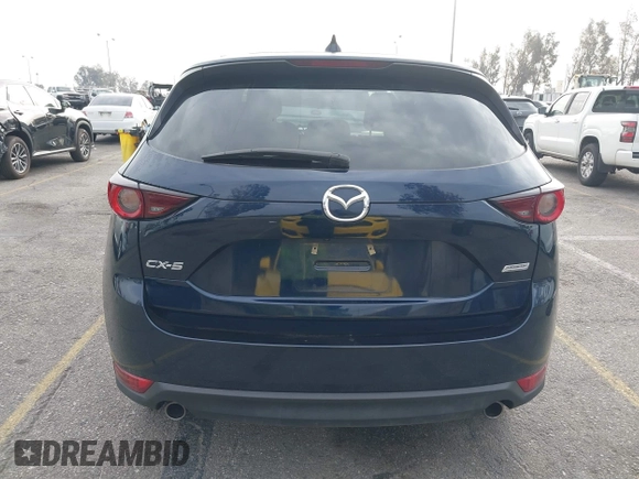 2019 Mazda CX-5 Touring with VIN JM3KFACM5K0697137, listed as a IAAI auction lot 41720253 with 50,416 mi miles. Bid and sale history available at carsss.com. Image 16.