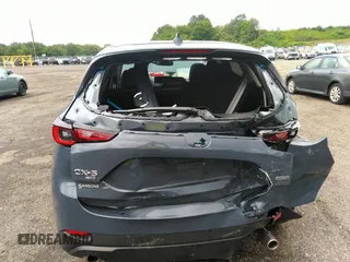 2023 Mazda CX-5 2.5 S Carbon Edition with VIN JM3KFBCM1P0209900, listed as a IAAI auction lot 37342913 with 3,853 mi miles. Bid and sale history available at carsss.com. Image 6.