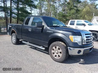 2011 Ford F-150 XL with VIN 1FTFX1EF1BFA36935, listed as a IAAI auction lot 42084512 with 200,000 mi miles. Bid and sale history available at carsss.com. Image 1.