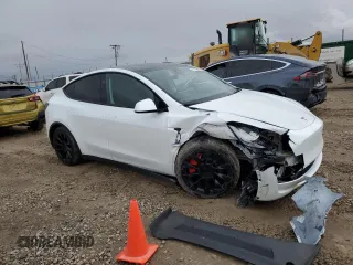 2024 Tesla Model Y Long Range with VIN 7SAYGAEE1RF061318, listed as a Copart auction lot 81142444 with 3,249 mi miles and Salvage Title. Bid and sale history available at DreamBid. Image 4.