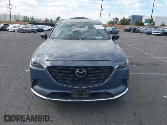 2021 Mazda CX-9 Grand Touring with VIN JM3TCADY1M0519288, listed as a IAAI auction lot 41186094 with 50,701 mi miles and . Bid and sale history available at DreamBid. Image 13.