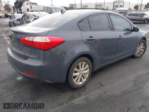 2016 Kia Forte LX with VIN KNAFX4A65G5603679, listed as a IAAI auction lot 42061229 with 89,413 mi miles. Bid and sale history available at carsss.com. Image 4.