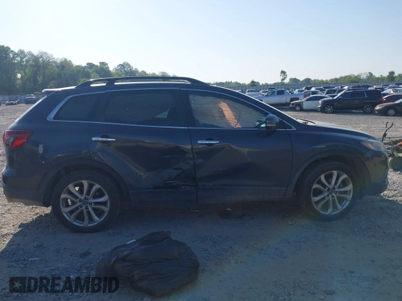 2013 Mazda CX-9 Grand Touring z VIN JM3TB2DA6D0424124, wystawiony jako IAAI lot #42032588 z przebiegiem 151 569 mil mil oraz . Historia ofert i sprzedaży dostępna na DreamBid. Obrazek 13.