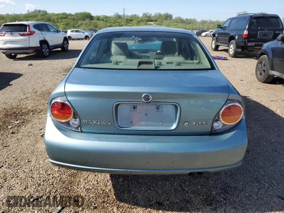 2002 Nissan Maxima GLE z VIN JN1DA31A92T302785, wystawiony jako Copart lot #57310725 z przebiegiem 95 192 mil mil oraz Szkoda całkowita • Salvage title. Historia ofert i sprzedaży dostępna na DreamBid. Obrazek 6.