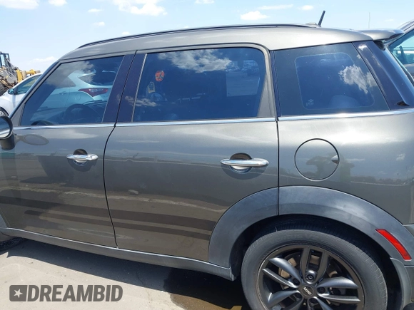 2014 MINI Countryman S with VIN WMWZC3C59EWP29137, listed as a IAAI auction lot 42661922 with 128,064 mi miles and . Bid and sale history available at DreamBid. Image 14.