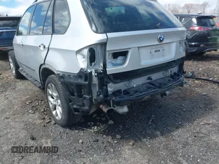 2012 BMW X5 35i z VIN 5UXZV4C56CL986384, wystawiony jako IAAI lot #41986665 z przebiegiem Nie podano mil oraz . Historia ofert i sprzedaży dostępna na DreamBid. Obrazek 18.