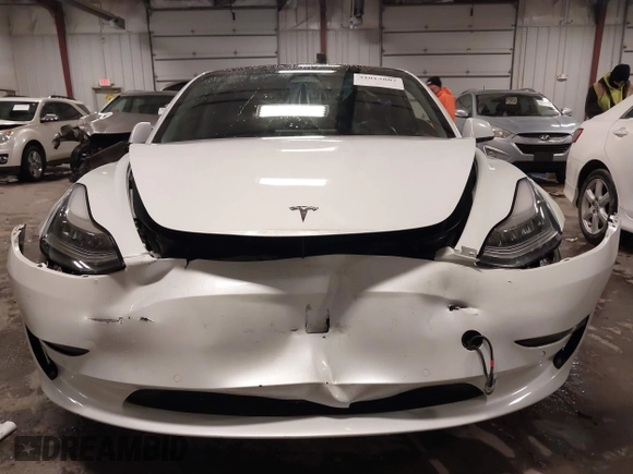 2018 Tesla Model 3 Long Range Battery with VIN 5YJ3E1EA8JF154738, listed as a IAAI auction lot 41013807 with 115,488 mi miles and . Bid and sale history available at DreamBid. Image 13.