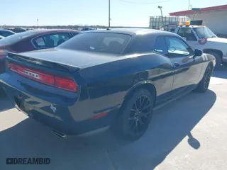 2014 Dodge Challenger SXT with VIN 2C3CDYAG8EH196157, listed as a IAAI auction lot 41730855 with 112,354 mi miles. Bid and sale history available at carsss.com. Image 4.