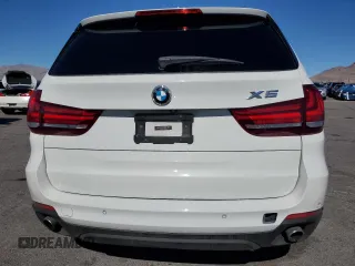 2015 BMW X5 xDrive35i z VIN 5UXKR0C50F0K62596, wystawiony jako Copart lot #45988185 z przebiegiem 128 771 mil mil oraz Szkoda całkowita • Salvage title. Historia ofert i sprzedaży dostępna na DreamBid. Obrazek 6.