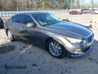 2014 Infiniti Q50 Premium with VIN JN1BV7AP5EM688451, listed as a IAAI auction lot 41364424 with 183,676 mi miles. Bid and sale history available at carsss.com. Image 1.