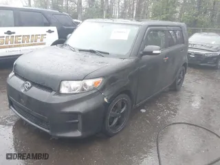 2012 Scion xB with VIN JTLZE4FE3CJ008728, listed as a IAAI auction lot 42000043 with 172,199 mi miles. Bid and sale history available at carsss.com. Image 17.
