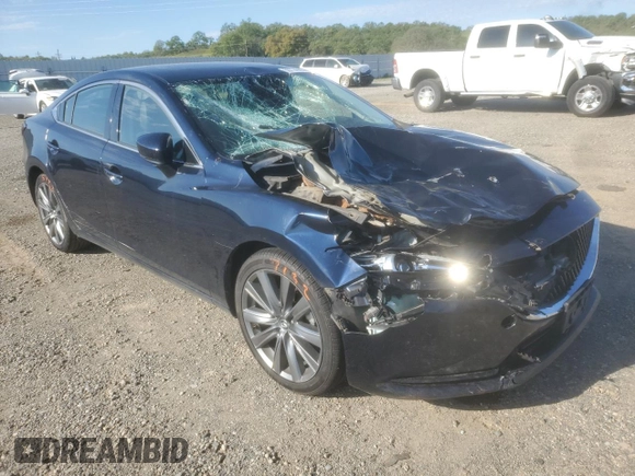 2019 Mazda 6 Touring with VIN JM1GL1VM5K1502586, listed as a Copart auction lot 50774985 with 70,088 mi miles and Salvage Title. Bid and sale history available at carsss.com. Image 4.