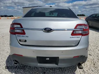 2013 Ford Taurus Limited z VIN 1FAHP2F80DG105499, wystawiony jako Copart lot #70792614 z przebiegiem 106 425 mil mil oraz Czysty tytuł • Clean title. Historia ofert i sprzedaży dostępna na DreamBid. Obrazek 6.
