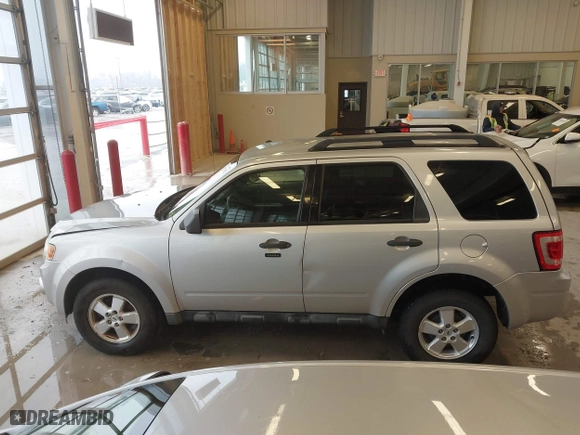2010 Ford Escape XLT with VIN 1FMCU0D70AKB09942, listed as a IAAI auction lot 41572582 with 218,296 mi miles. Bid and sale history available at carsss.com. Image 15.