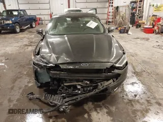 2018 Ford Fusion Hybrid Titanium with VIN 3FA6P0RU4JR147831, listed as a IAAI auction lot 41586033 with 101,088 mi miles. Bid and sale history available at carsss.com. Image 12.