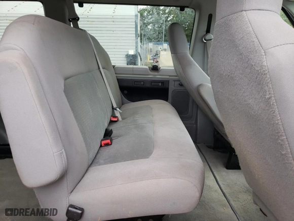 2014 Ford Econoline Wagon XL with VIN 1FBNE3BL0EDA92960, listed as a Copart auction lot 68583924 with 73,153 mi miles and Salvage Title. Bid and sale history available at carsss.com. Image 11.