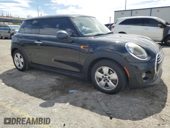 2019 MINI Hardtop Cooper with VIN WMWXP5C5XK2H29936, listed as a Copart auction lot 56713285 with 80,303 mi miles and Salvage title. Bid and sale history available at DreamBid. Image 4.