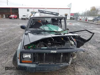 1998 Jeep Cherokee Sport z VIN 1J4FJ68S7WL264849, wystawiony jako IAAI lot #41931068 z przebiegiem Nie podano mil oraz . Historia ofert i sprzedaży dostępna na DreamBid. Obrazek 12.