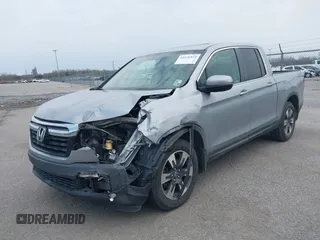 2019 Honda Ridgeline RTL with VIN 5FPYK2F50KB004055, listed as a IAAI auction lot 41576975 with 128,620 mi miles and . Bid and sale history available at DreamBid. Image 17.