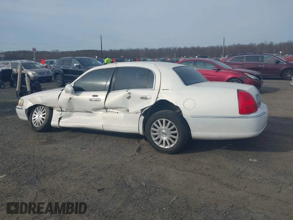 2003 Lincoln Town Car Signature z VIN 1LNHM82W33Y615344, wystawiony jako IAAI lot #41761302 z przebiegiem Nie podano mil oraz . Historia ofert i sprzedaży dostępna na DreamBid. Obrazek 15.