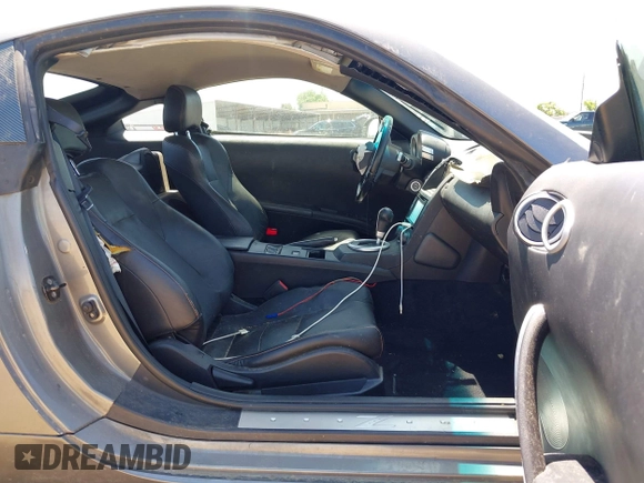 2004 Nissan 350Z Touring z VIN JN1AZ34E94M155097, wystawiony jako IAAI lot #42273474 z przebiegiem Nie podano mil oraz . Historia ofert i sprzedaży dostępna na DreamBid. Obrazek 5.
