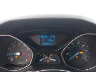2013 Ford Focus S with VIN 1FADP3E20DL332636, listed as a IAAI auction lot 40917274 with 112,956 mi miles. Bid and sale history available at carsss.com. Image 7.