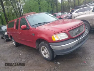 2000 Ford F-150 XL with VIN 1FTRX17W5YNB91724, listed as a IAAI auction lot 41954818 with 156,718 mi miles. Bid and sale history available at carsss.com. Image 1.