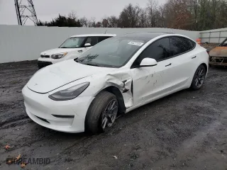 2022 Tesla Model 3 Long Range with VIN 5YJ3E1EB2NF275845, listed as a Copart auction lot 84527134 with 41545 miles and Salvage Title. Bid and sale history available at carsss.com. Image 1.