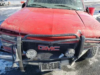 1997 GMC Suburban z VIN 3GKGK26J9VG515459, wystawiony jako Copart lot #87515385 z przebiegiem 205 982 mil mil oraz Szkoda całkowita • Salvage title. Historia ofert i sprzedaży dostępna na DreamBid. Obrazek 14.