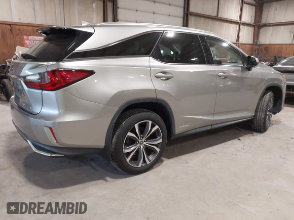 2018 Lexus RX 450hL Premium z VIN JTJDGKCA6J2004313, wystawiony jako IAAI lot #42270567 z przebiegiem 72 692 mil mil oraz . Historia ofert i sprzedaży dostępna na DreamBid. Obrazek 4.