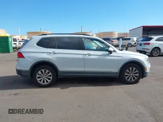 2018 Volkswagen Tiguan SEL z VIN 3VV3B7AX7JM126402, wystawiony jako IAAI lot #42046690 z przebiegiem 54 790 mil mil oraz . Historia ofert i sprzedaży dostępna na DreamBid. Obrazek 13.