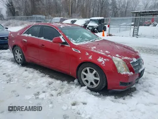 2008 Cadillac CTS AWD w/1SB with VIN 1G6DS57VX80129520, listed as a IAAI auction lot 41569142 with 131,828 mi miles. Bid and sale history available at carsss.com. Image 1.