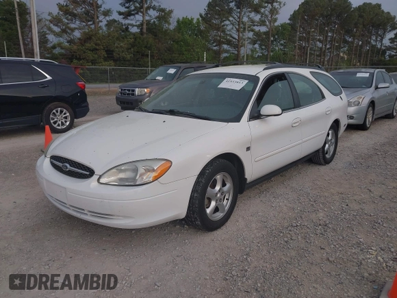 2003 Ford Taurus SE z VIN 1FAFP58S63A158422, wystawiony jako IAAI lot #41933813 z przebiegiem 71 990 mil mil oraz . Historia ofert i sprzedaży dostępna na DreamBid. Obrazek 2.
