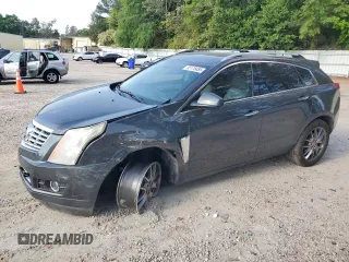 2016 Cadillac SRX Performance Collection z VIN 3GYFNCE30GS572828, wystawiony jako Copart lot #55176485 z przebiegiem 108 767 mil mil oraz Szkoda całkowita • Salvage title. Historia ofert i sprzedaży dostępna na DreamBid. Obrazek 1.