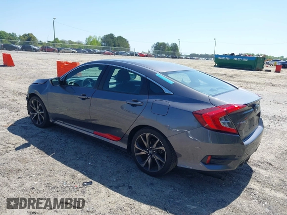 2019 Honda Civic Sport with VIN 2HGFC2F85KH576547, listed as a IAAI auction lot 42024497 with 86,468 mi miles and . Bid and sale history available at DreamBid. Image 3.