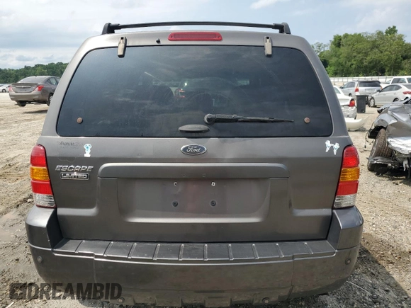 2005 Ford Escape Limited with VIN 1FMYU04115KA63383, listed as a Copart auction lot 59706164 with 212,167 mi miles and Salvage Title. Bid and sale history available at carsss.com. Image 6.