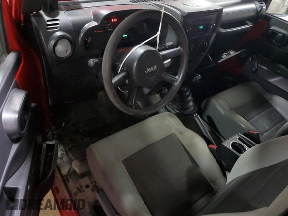 2009 Jeep Wrangler X с VIN 1J4FA24179L734789, выставлен на аукционе Copart как лот 54131245 с пробегом 98 239 миль миль и Списание • Salvage title. История ставок и продаж доступна на DreamBid. Изображение 8.