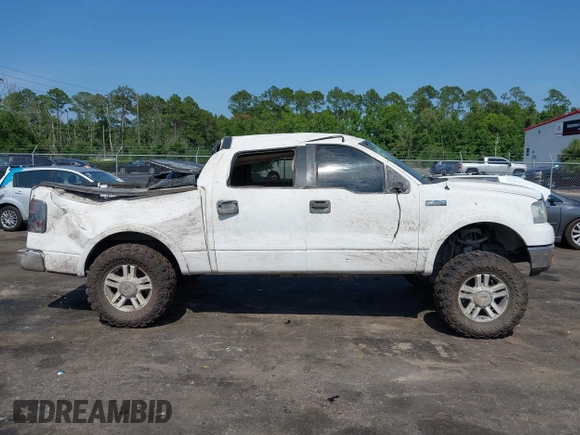 2005 Ford F-150 XLT z VIN 1FTPW14595KD49565, wystawiony jako IAAI lot #42587713 z przebiegiem 360 588 mil mil oraz . Historia ofert i sprzedaży dostępna na DreamBid. Obrazek 14.