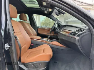 2014 BMW X6 xDrive35i z VIN 5UXFG2C57E0K41455, wystawiony jako Copart lot #58616315 z przebiegiem 162 232 mil mil oraz Tytuł czysty. Historia ofert i sprzedaży dostępna na DreamBid. Obrazek 5.