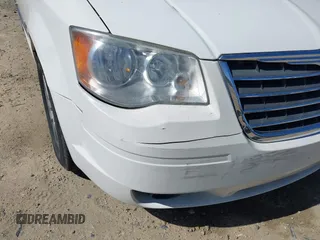 2009 Chrysler Town & Country Touring with VIN 2A8HR54X89R642118, listed as a IAAI auction lot 41844247 with 161,651 mi miles and . Bid and sale history available at DreamBid. Image 17.