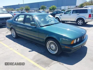 1990 BMW 5 Series with VIN WBAHD2315LBF68499, listed as a IAAI auction lot 42815606 with 192,541 mi miles and . Bid and sale history available at DreamBid. Image 1.