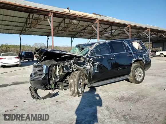 2019 GMC Yukon SLE with VIN 1GKS1AKC6KR302642, listed as a Copart auction lot 41510715 with 97,906 mi miles and Salvage Title. Bid and sale history available at carsss.com. Image 12.