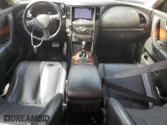 2014 Infiniti QX70 z VIN JN8CS1MU4EM451883, wystawiony jako Copart lot #61744725 z przebiegiem 60 393 mil mil oraz Czysty tytuł • Clean title. Historia ofert i sprzedaży dostępna na DreamBid. Obrazek 8.