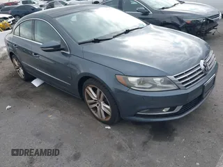 2013 Volkswagen CC Lux with VIN WVWRP7AN8DE507811, listed as a IAAI auction lot 41447468 with 147,162 mi miles. Bid and sale history available at carsss.com. Image 1.