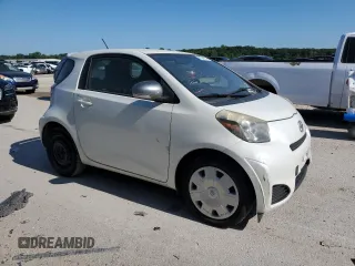 2012 Scion iQ with VIN JTNJJXB06CJ019475, listed as a Copart auction lot 61358615 with 94,194 mi miles and Clean title. Bid and sale history available at DreamBid. Image 4.