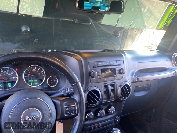 2017 Jeep Wrangler Willys Wheeler z VIN 1C4AJWAGXHL602088, wystawiony jako Copart lot #80106684 z przebiegiem 101 804 mil mil oraz Czysty tytuł • Clean title. Historia ofert i sprzedaży dostępna na DreamBid. Obrazek 9.